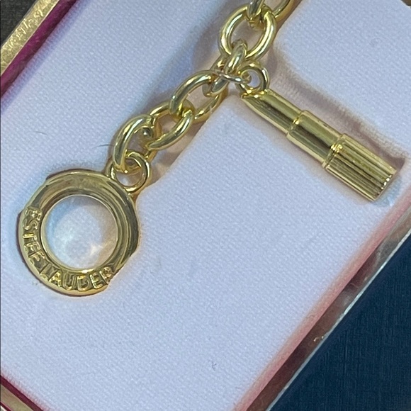 NIB Estee Lauder Limited Edition “Golden Icons” Charm Bracelet - Picture 4 of 8
